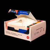 Box of eco-friendly disposable towels with colorful packaging on a pink background