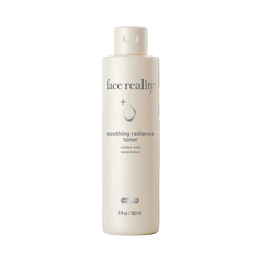 Bottle of 'face reality' soothing radiance toner on a white background